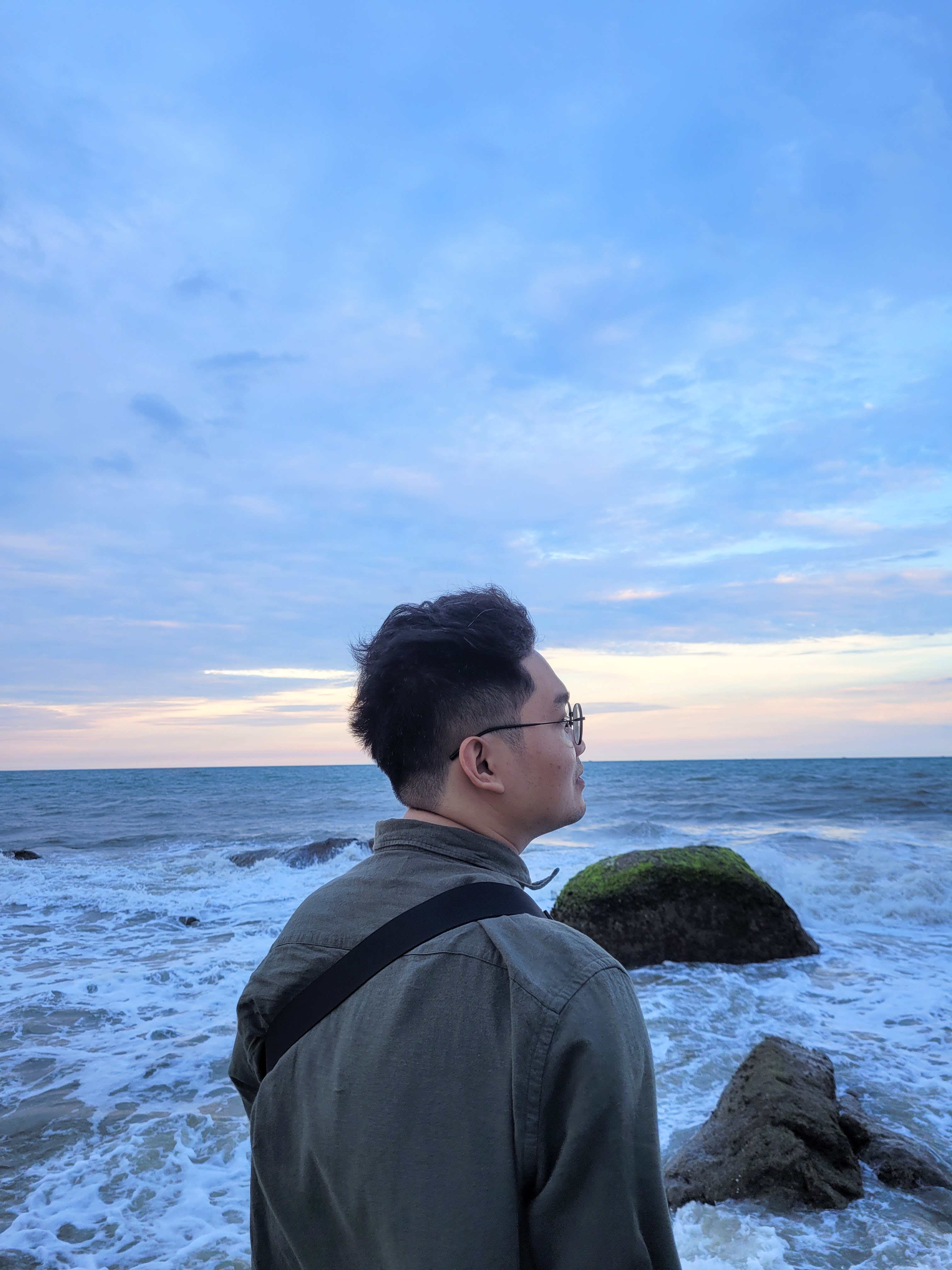 Professional portrait of Hai Trinh (Ethan Nguyen), Software Engineer specializing in React.js and Frontend Development